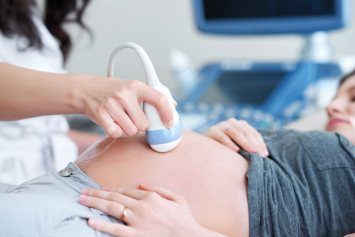 Cropped close up of a pregnant woman having ultrasound scanning at the medical clinic copyspace equipment technology modern pregnancy medicine people lifestyle family planning patient occupation.